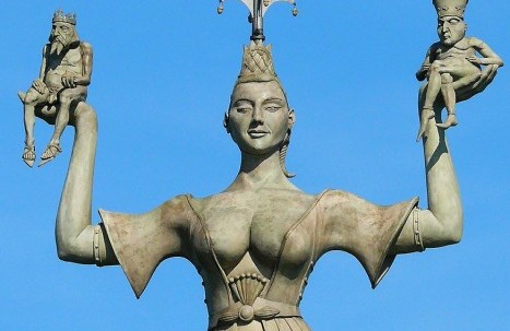  The Imperia statue at Constance harbor, a rotating sculpture holding two small figures representing the pope and emperor.