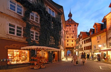 Historic city gate Schnetztor in Konstanz featuring a prominent tower and medieval half-timbered architecture
