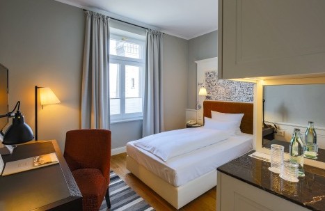The Superior Single Room at Hotel Halm Constance combines stylish design with modern comfort