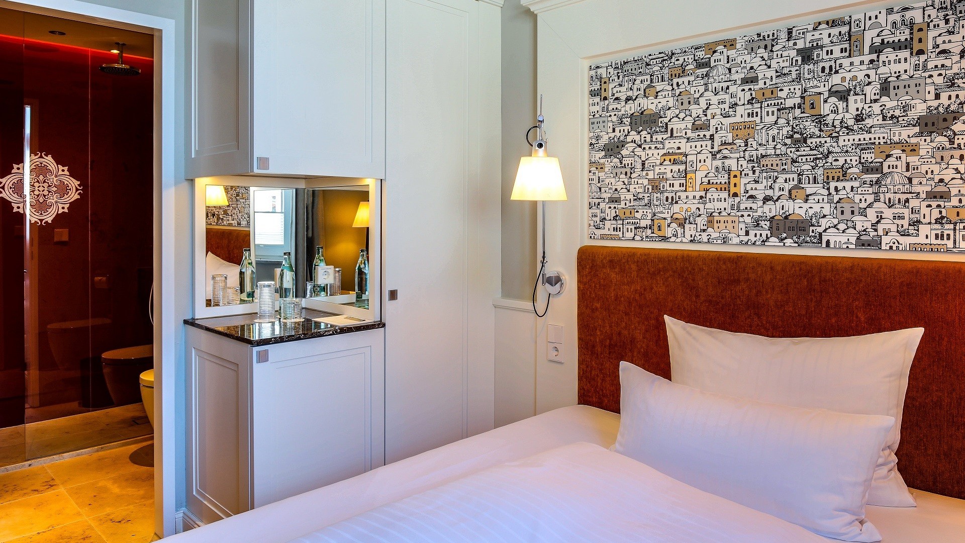 The Superior Single Room with Lake view at Hotel Halm Constance combines stylish design with modern comfort