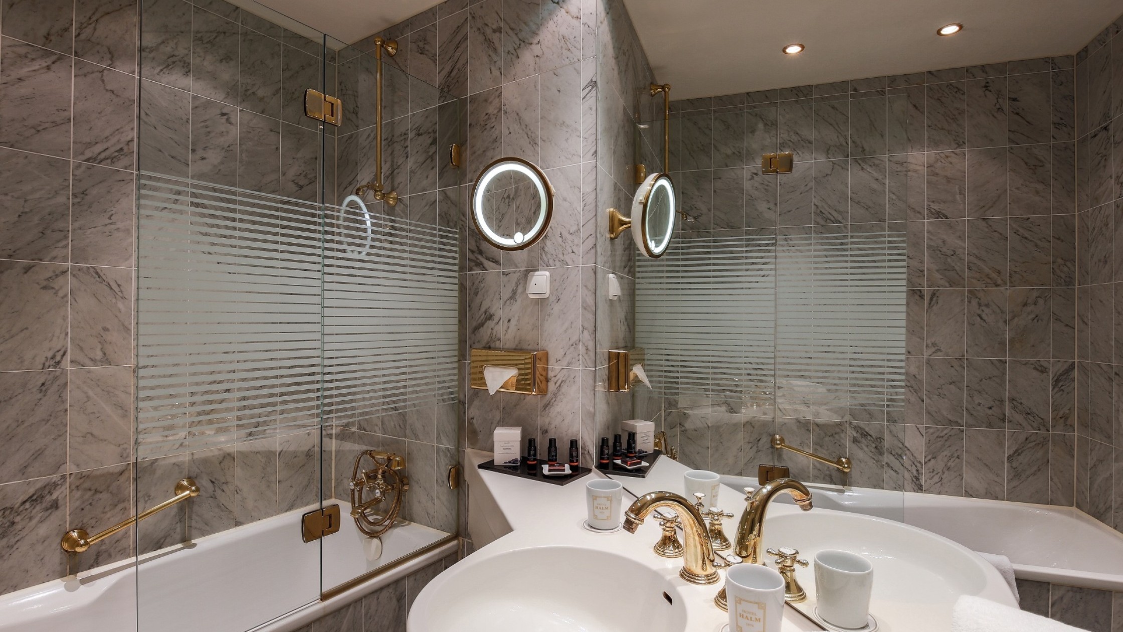 Classic hotel bathroom at Hotel Halm Constance with bathtub