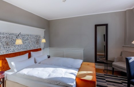 uperior double room at Hotel Halm Constance with elegant design and modern amenities.